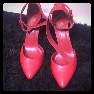 Beautiful red pumps with double strap gold buckle